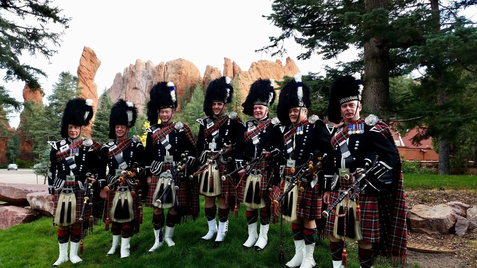 Kenneth McBride, with pipe band