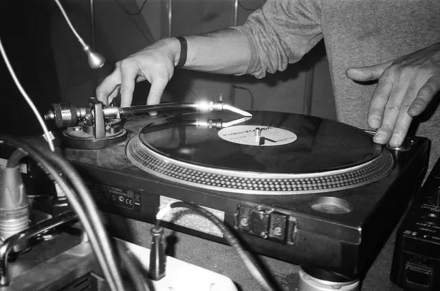 close up of DJ with vinyl