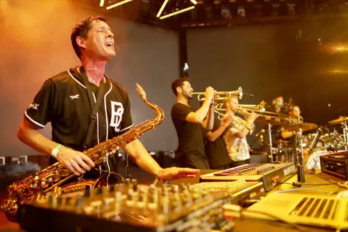 DJ playing saxophone