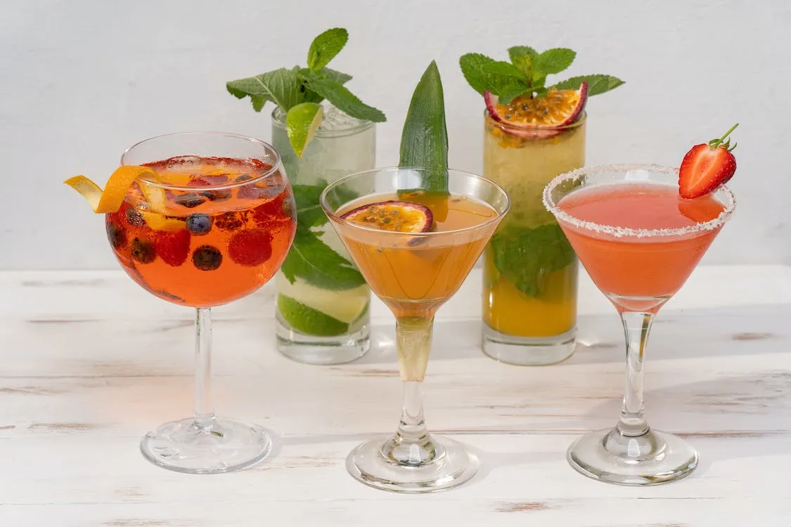 close up of five cocktails