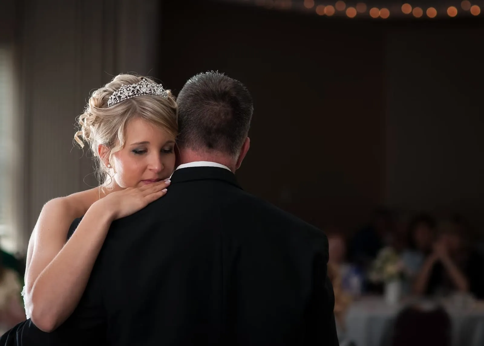 father of the bride and bride dancing 