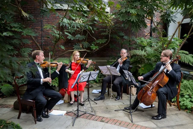Stretto Ensemble performing outdoors