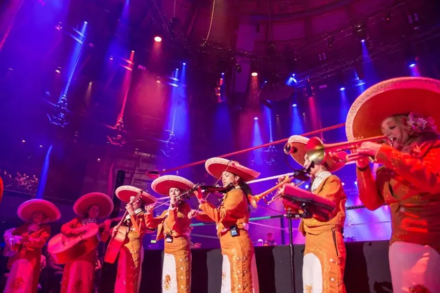 Mariachi Los Adelitas performing for a crowd