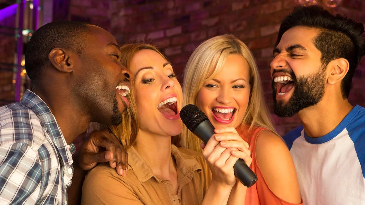group of friends singing karaoke