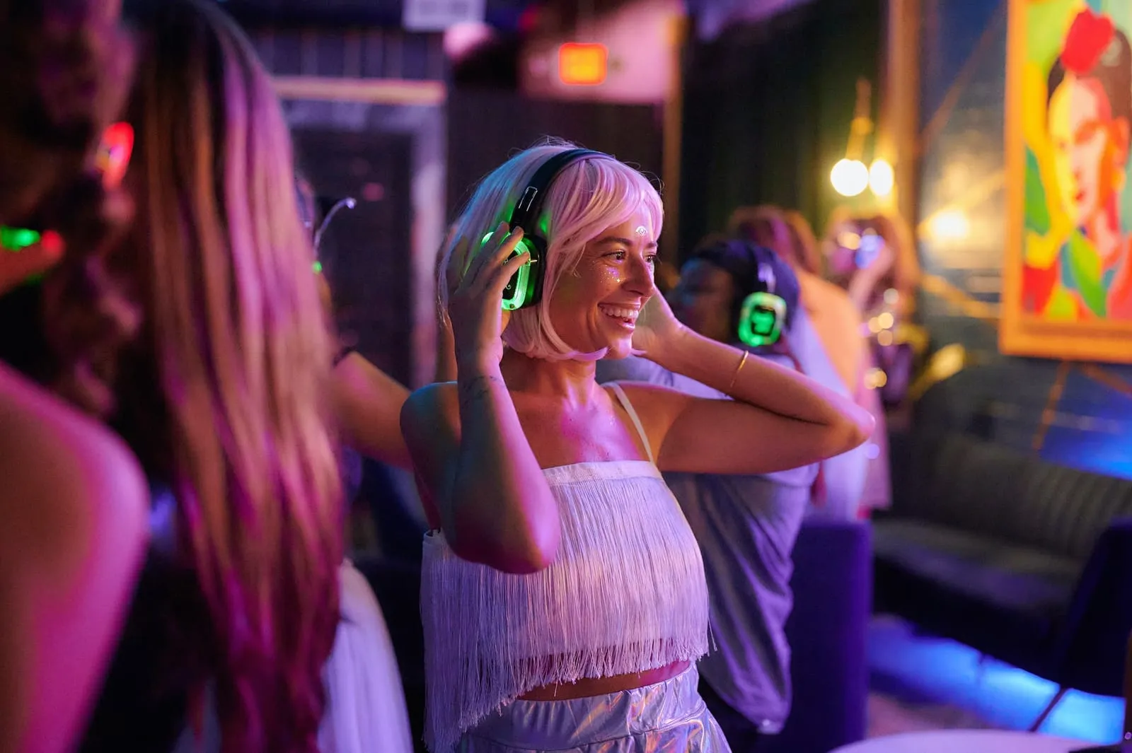 woman in a silent disco head gear for birthday wedding