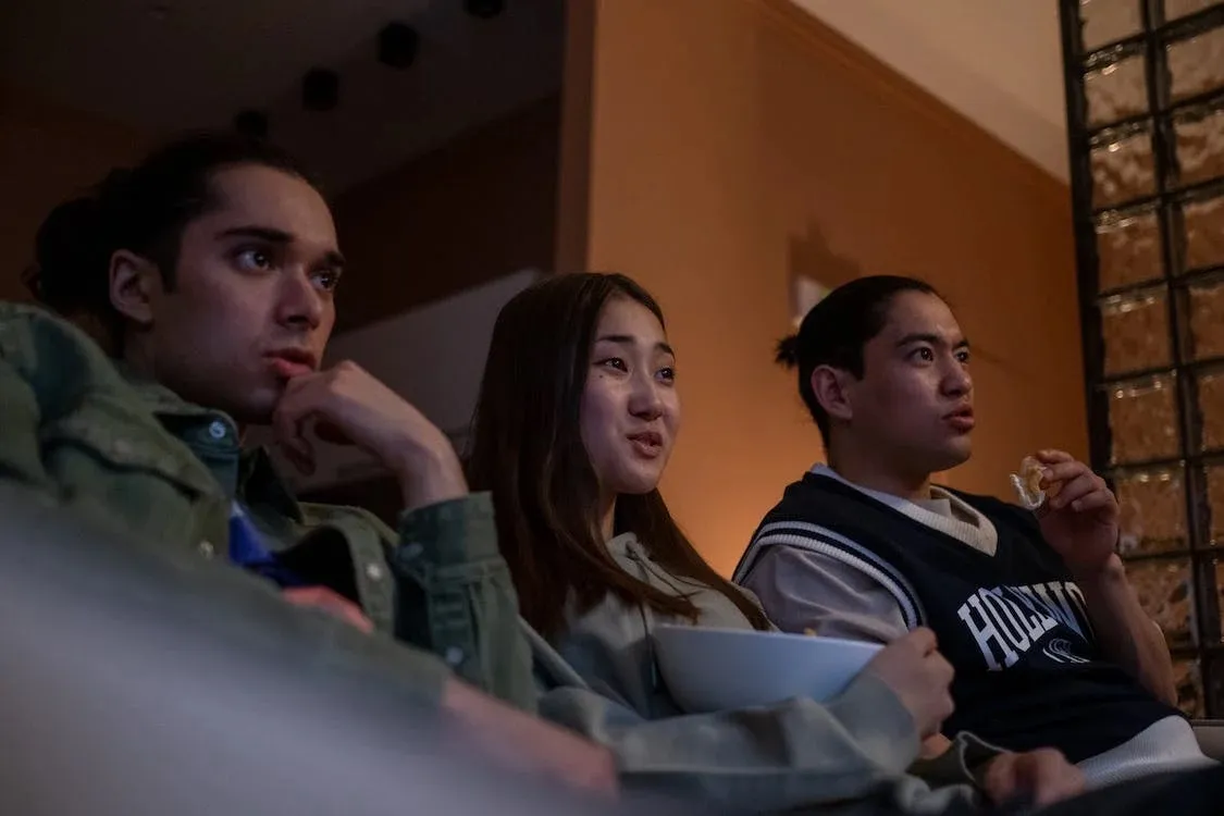 friends watching TV together, bridgerton themed watch party